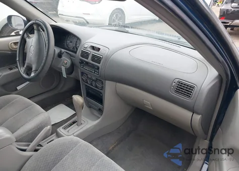 2002 Toyota Corolla Le из США, поврежденный, VIN 2T1BR12E82C545451